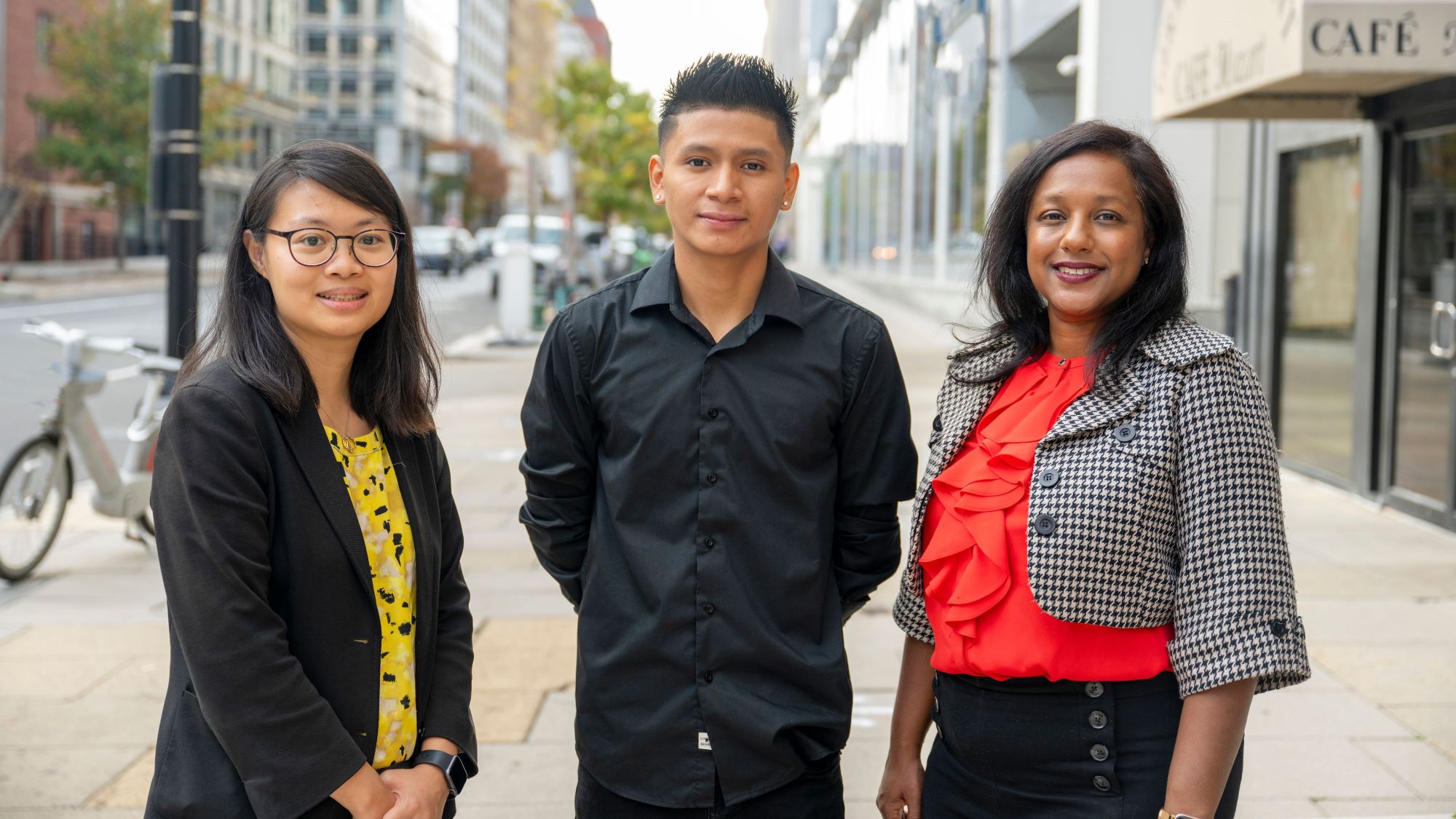 Legal Aid DC immigration client Pablo Cardenas with attorneys Wendy Cheng and Deepa Bijpuria