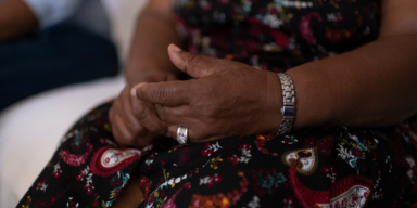 A woman's hands in her lap